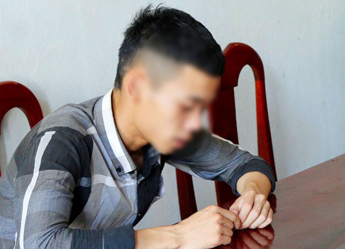 Lộc tại cơ quan điều tra. Ảnh: C.A