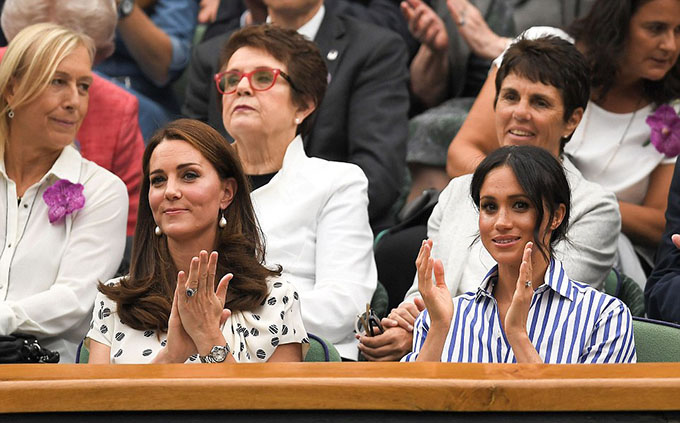 Kate and Meghan cheer from their Centre Court seats, where Serena Williams will play Angelique Kerber this afternoon